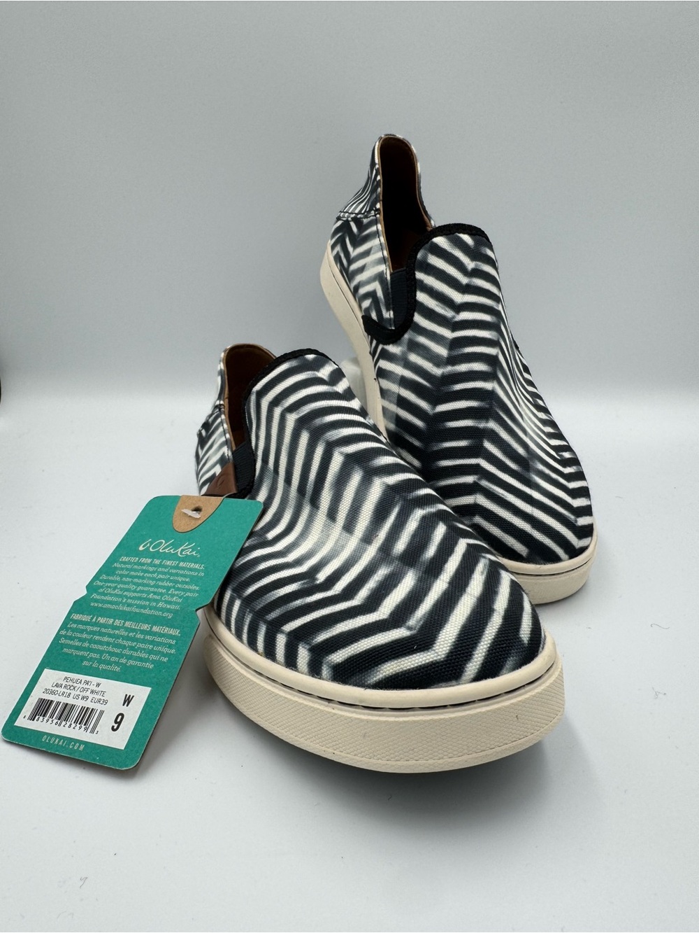 OluKai, Pehuea Pa’i slip-ons, women’s size 9, lava rock/off white, 20360-LR18